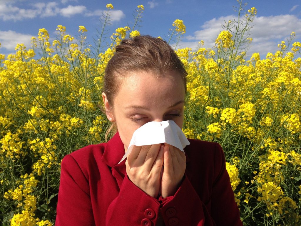 A women needing acupuncture to help with her allergies.